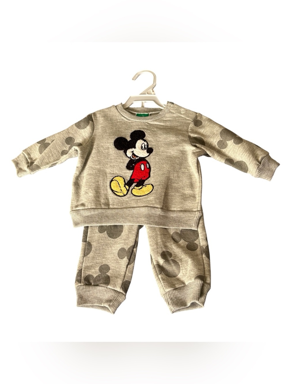 Disney White and Green Infant Clothing Care Tag